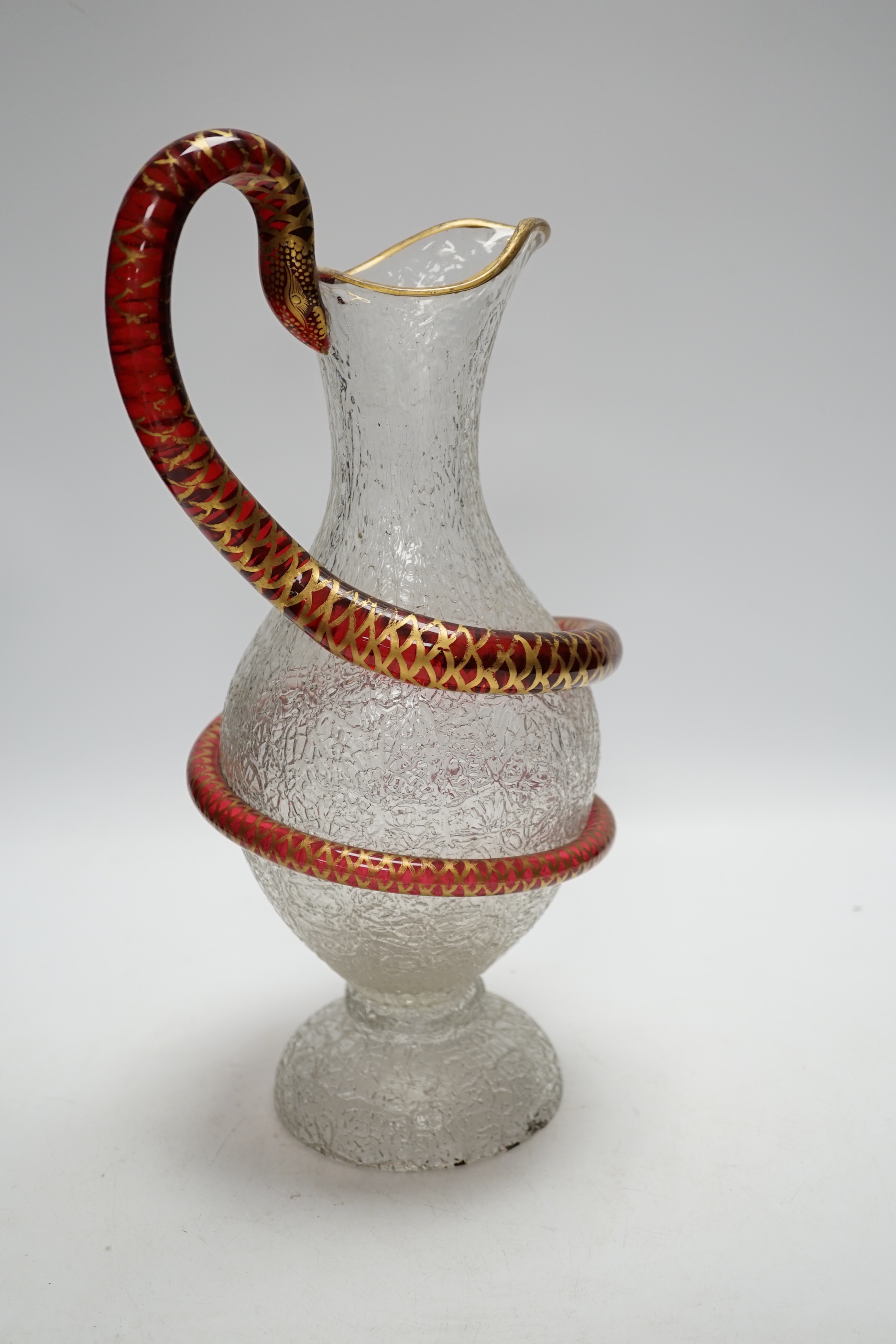 A Victorian Richardson’s of Stourbridge crackleware glass snake handled champagne ewer, 35cm high